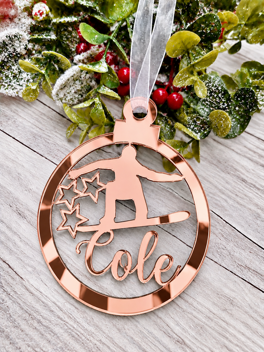 Personalised snowboarder Christmas decoration in rose gold mirrored acrylic