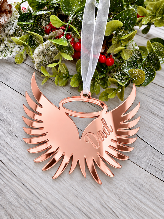 Angel wings in memory Christmas decoration in rose gold mirrored acrylic engraved with a name