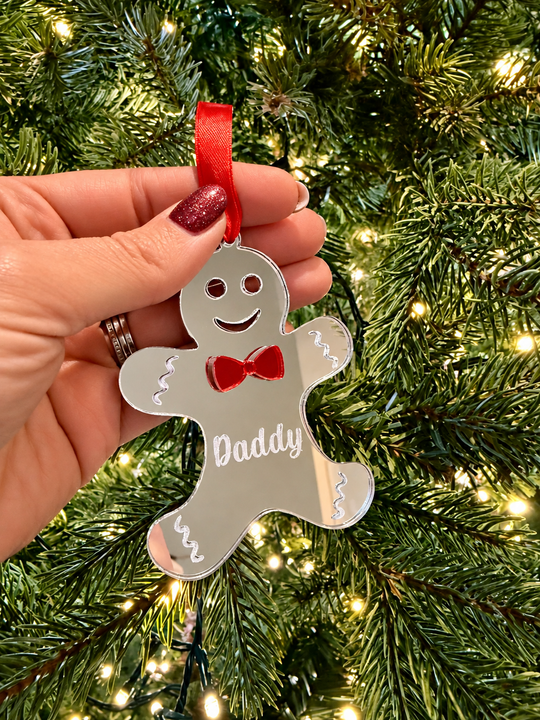 Personalised silver acrylic Christmas ornament showing engraved name