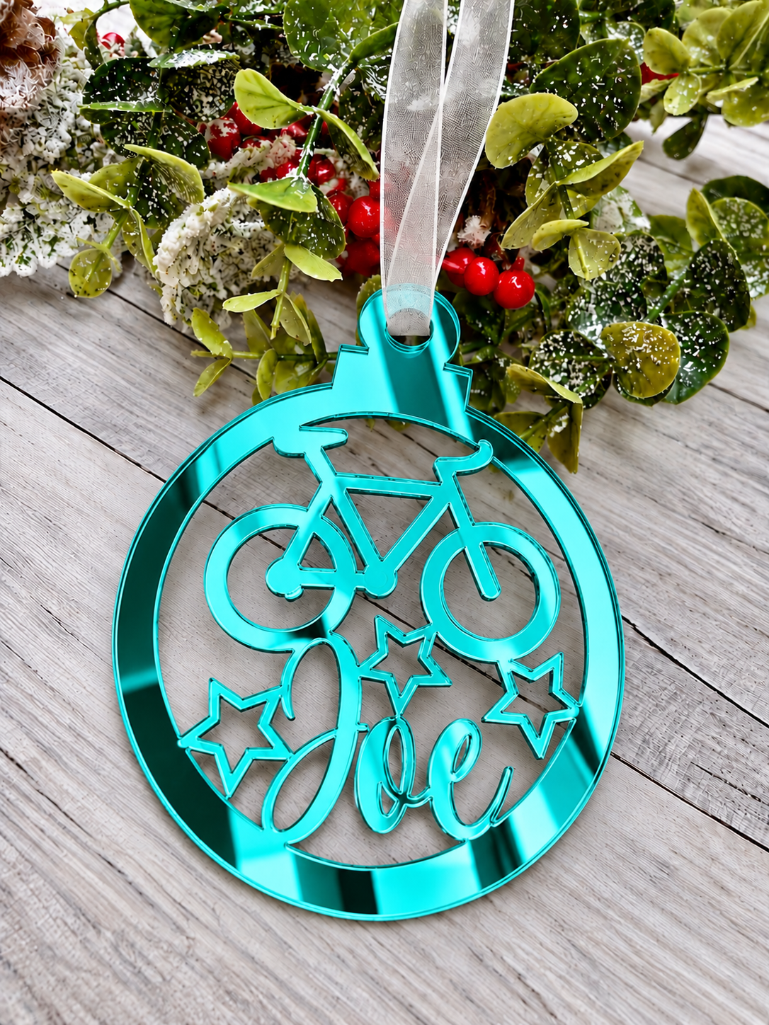 Load image into Gallery viewer, Personalised cyclist Christmas decoration in teal mirrored acrylic
