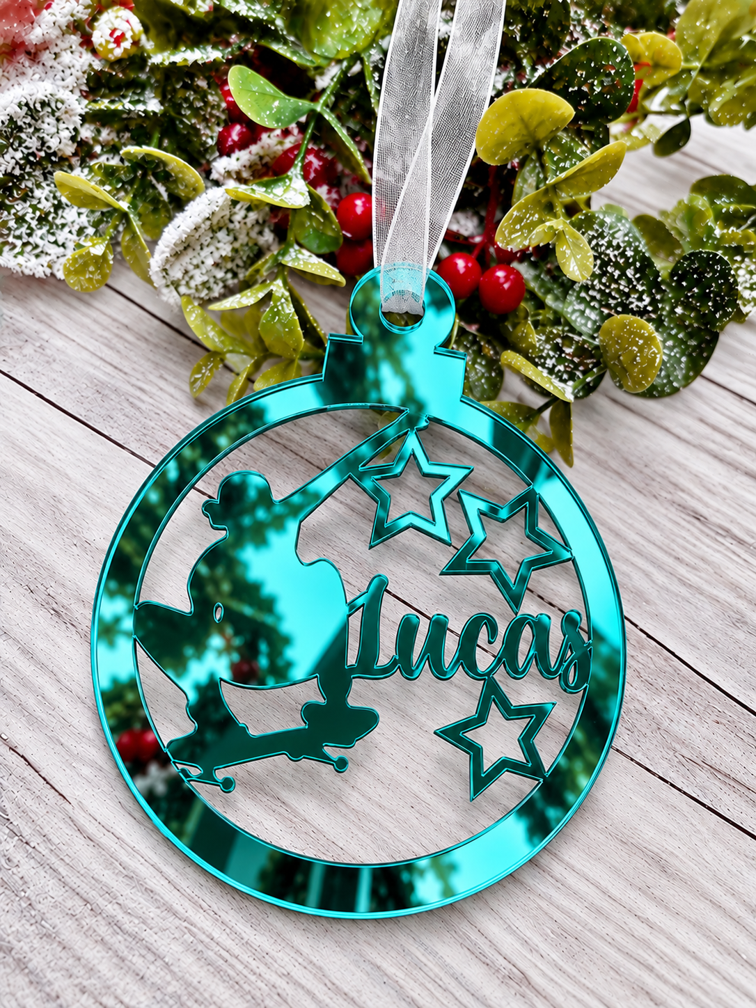Load image into Gallery viewer, Personalised skateboarder Christmas decoration in teal mirrored acrylic
