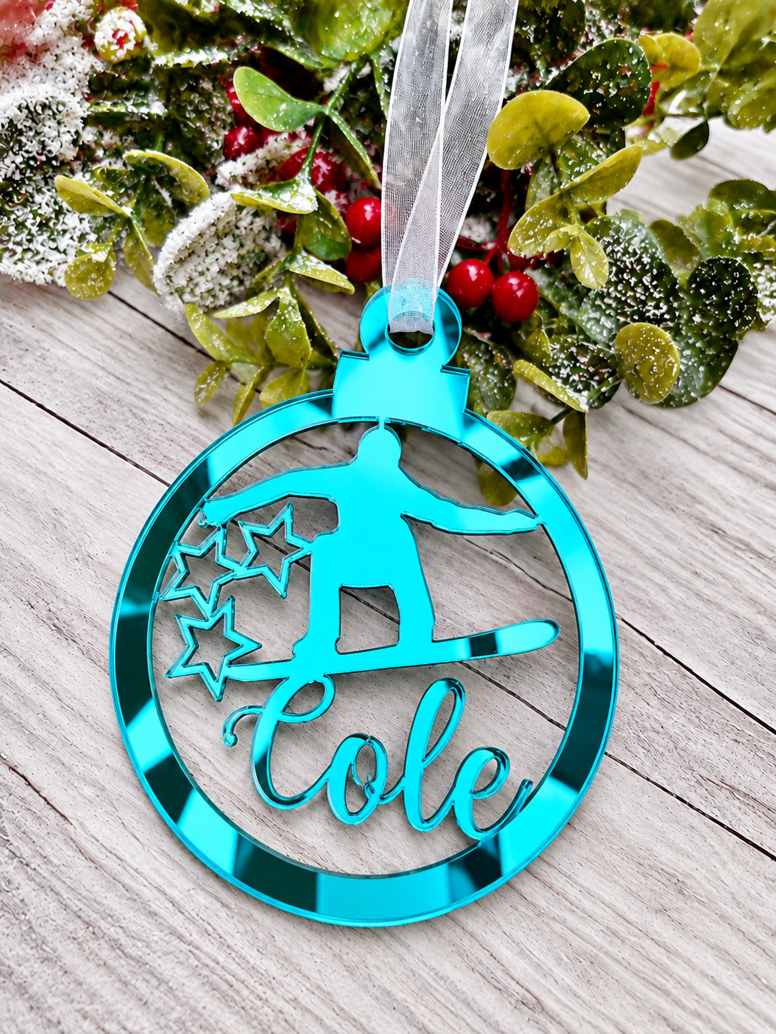 Load image into Gallery viewer, Personalised snowboarder Christmas decoration in teal mirrored acrylic
