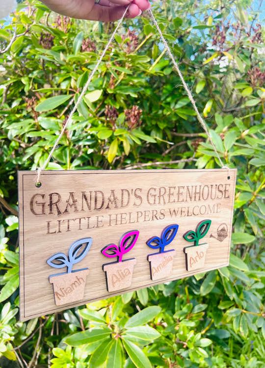 Custom Grandad’s Greenhouse wooden sign with watering can and plant design, perfect gift for gardeners and grandads.
