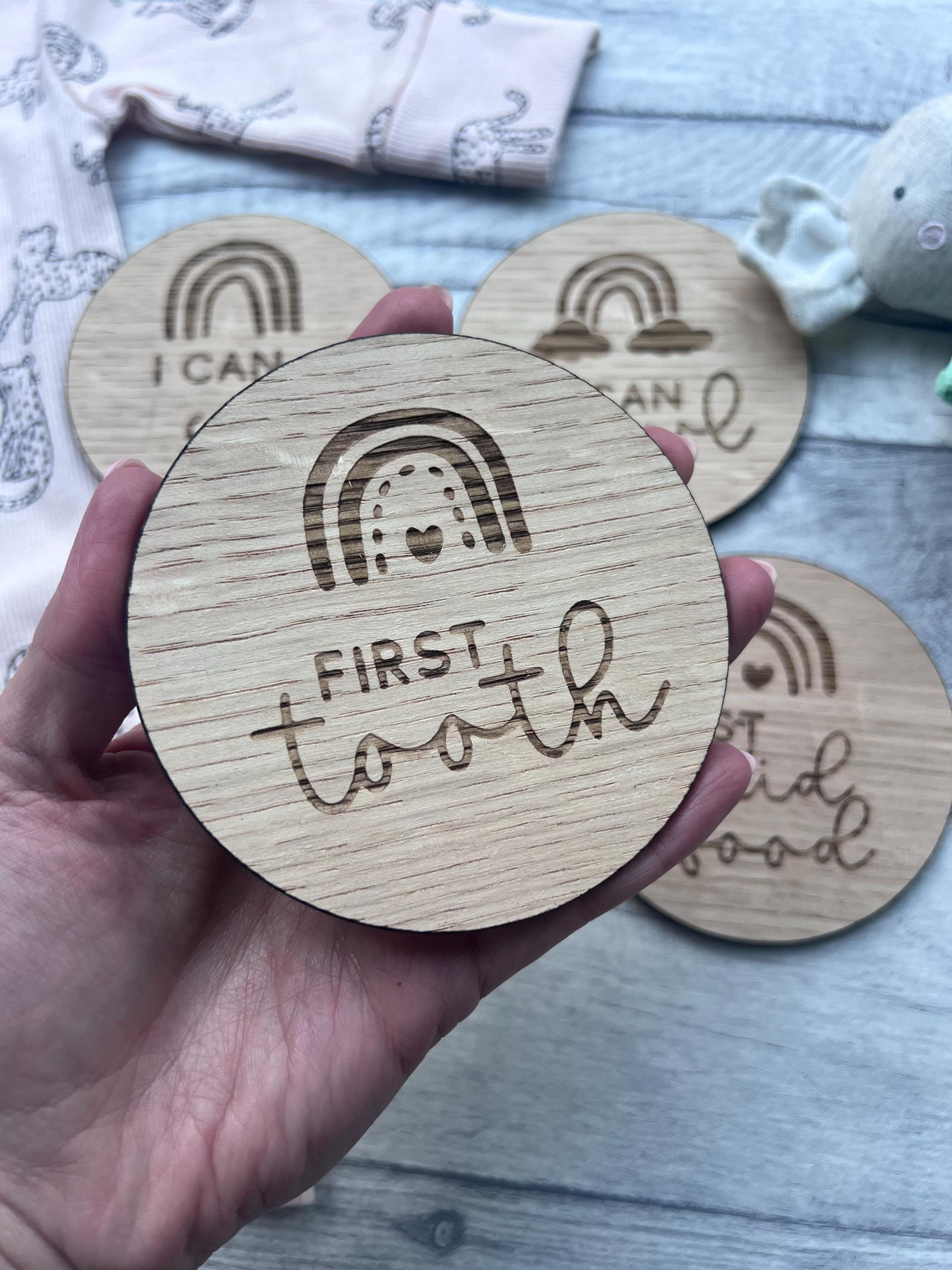 Load image into Gallery viewer, Personalised wooden baby milestone discs with rainbow theme, engraved with baby's milestones. Perfect for newborn gifts, baby showers, and capturing special moments.
