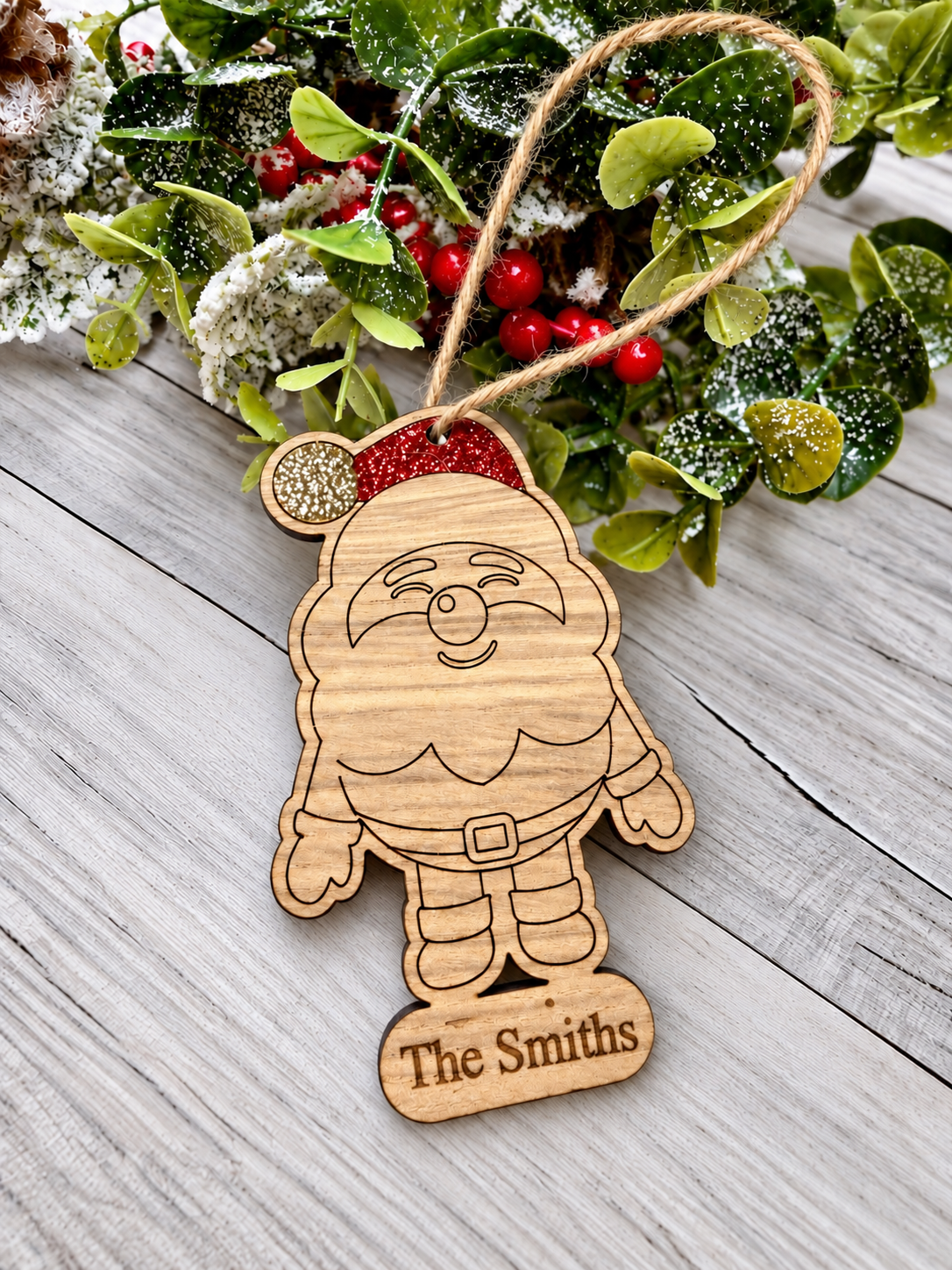 Load image into Gallery viewer, Personalised glittered Santa Christmas decoration in oak veneer (photo 3)
