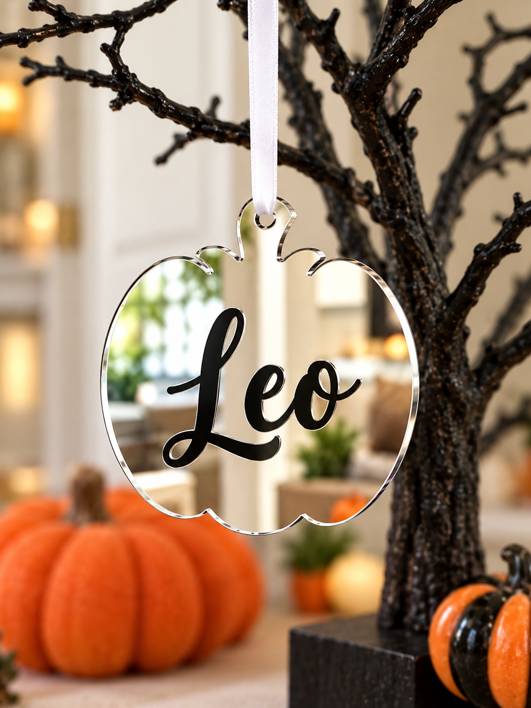 Load image into Gallery viewer, Personalised pumpkin Halloween tree decoration in silver mirrored acrylic with the name in black
