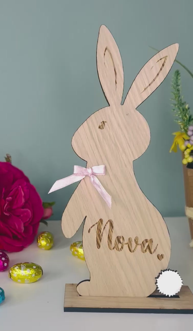 Load and play video in Gallery viewer, Personalised wooden Easter bunny decoration, engraved with custom name. Perfect for Easter gifts, baskets, and festive home decor
