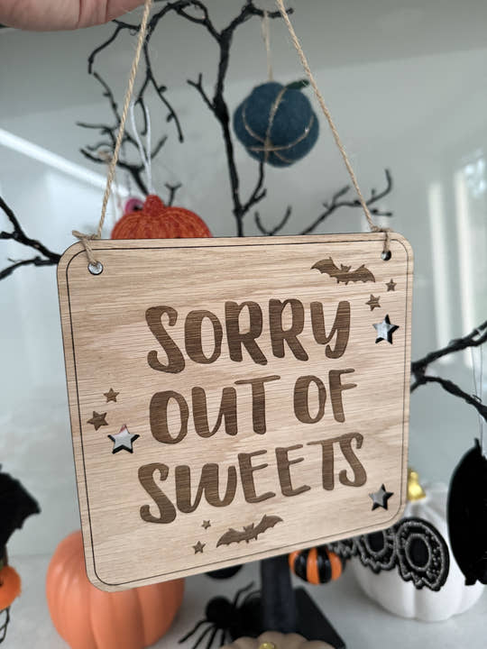 Oak Sorry out of sweets Halloween hanging sign with bats and stars on jute twine