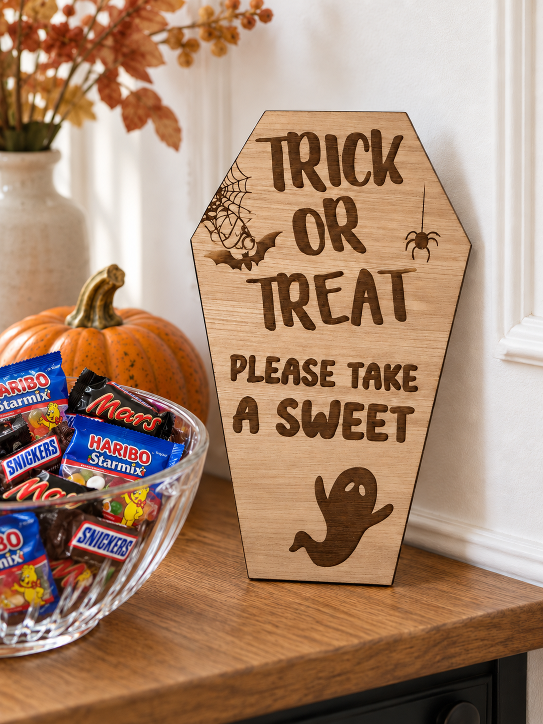 Load image into Gallery viewer, Oak trick or treat please take a sweet sign beside a bowl of Haribo and fun size chocolate bars
