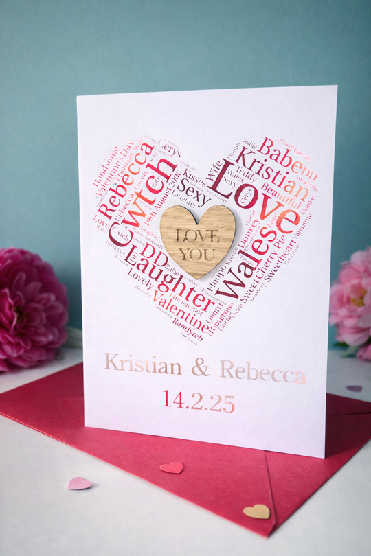 Personalised Valentine’s or anniversary card featuring heart shaped word art and engraved wooden heart centre, customised with names and special date